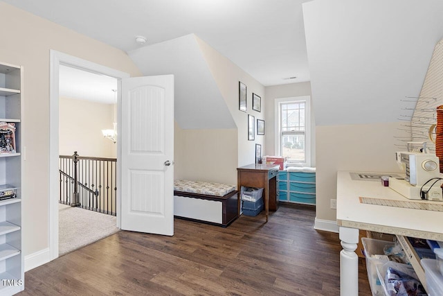 interior space featuring built in features and dark wood-type flooring