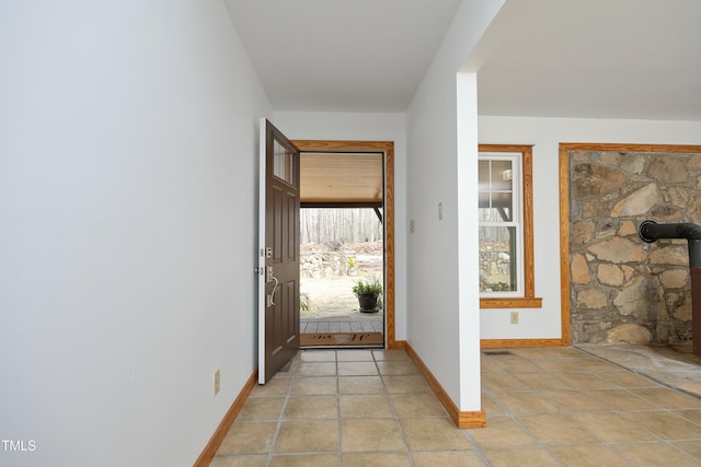 540 Patterson Dr, Chapel Hill, NC 27516 - entryway featuring baseboards and a wood stove
