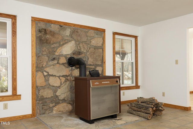 540 Patterson Dr, Chapel Hill, NC 27516 - details featuring a wood stove and baseboards