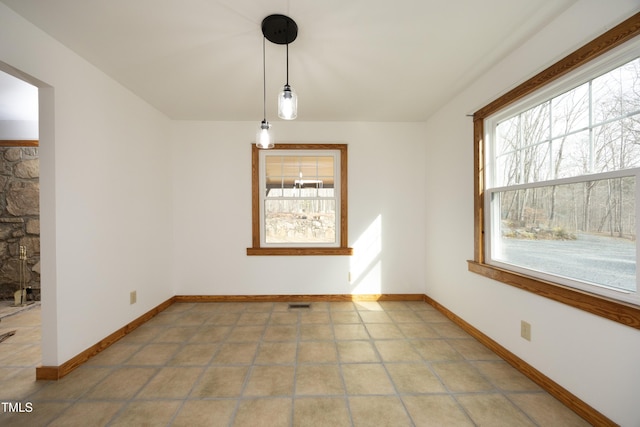 540 Patterson Dr, Chapel Hill, NC 27516 - unfurnished dining area featuring baseboards and visible vents