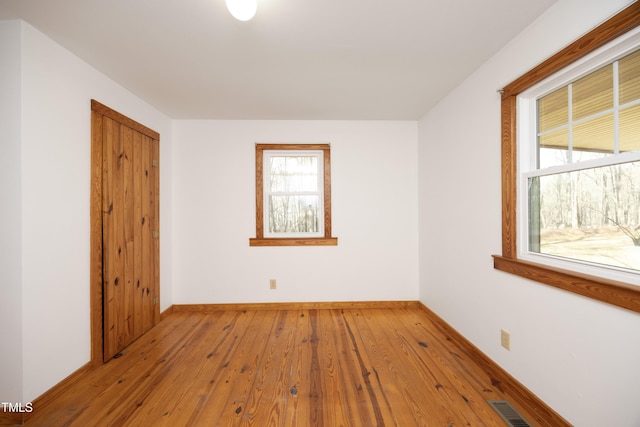 540 Patterson Dr, Chapel Hill, NC 27516 - empty room featuring wood-type flooring, baseboards, and visible vents