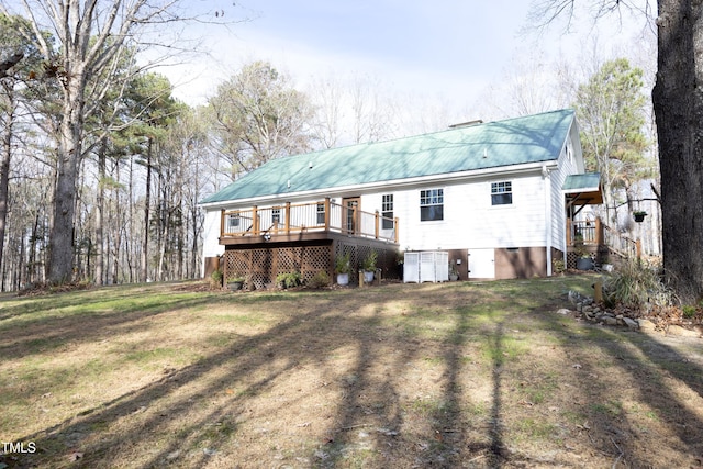 540 Patterson Dr, Chapel Hill, NC 27516 - back of house featuring a lawn, a deck, and metal roof