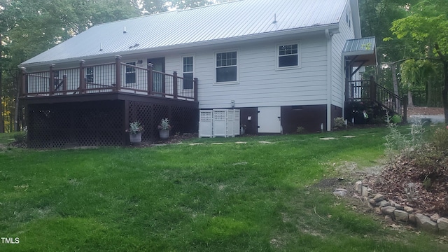 540 Patterson Dr, Chapel Hill, NC 27516 - rear view of property with a lawn, a wooden deck, and metal roof