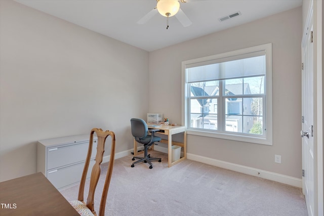 office with ceiling fan and light colored carpet