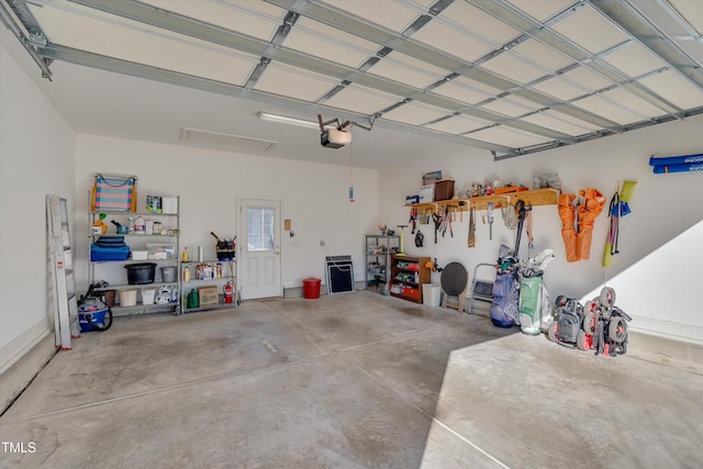 garage featuring a garage door opener