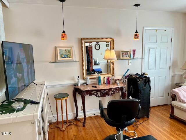 home office with light wood-type flooring