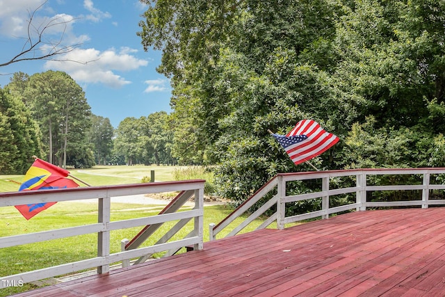 deck featuring a yard