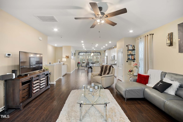 living area with recessed lighting, visible vents, dark wood-style flooring, and ceiling fan