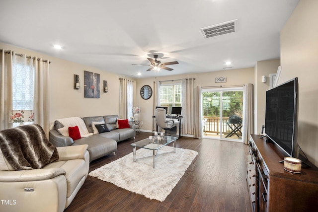 living area with recessed lighting, dark wood-style floors, visible vents, and ceiling fan