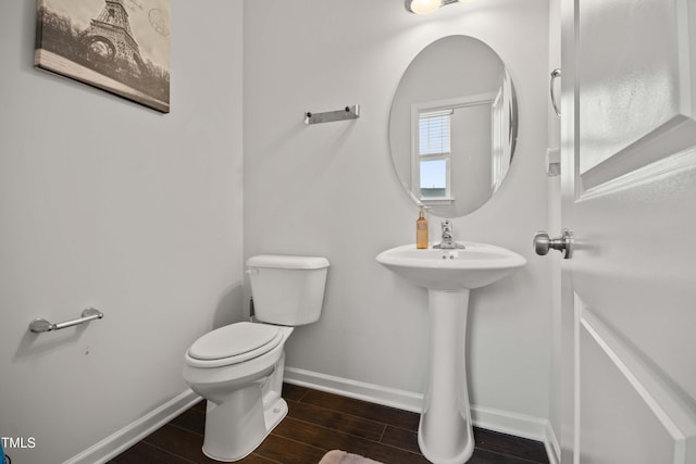 bathroom with toilet and sink