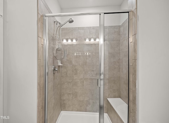 bathroom featuring a shower stall