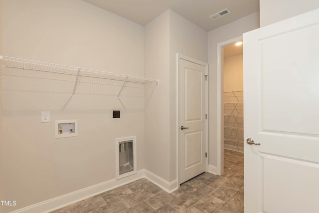 laundry area featuring baseboards, visible vents, hookup for an electric dryer, laundry area, and washer hookup