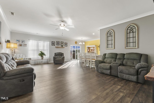 living room with dark hardwood / wood-style flooring, ceiling fan with notable chandelier, and crown molding