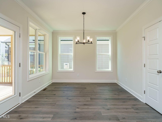 1809 Bright Lantern Way, Wendell, NC 27591 - unfurnished dining area featuring a chandelier, crown molding, and dark wood finished floors