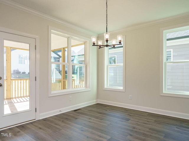 1809 Bright Lantern Way, Wendell, NC 27591 - unfurnished dining area with a chandelier, ornamental molding, and dark wood finished floors