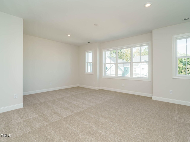 1809 Bright Lantern Way, Wendell, NC 27591 - empty room with light carpet and recessed lighting