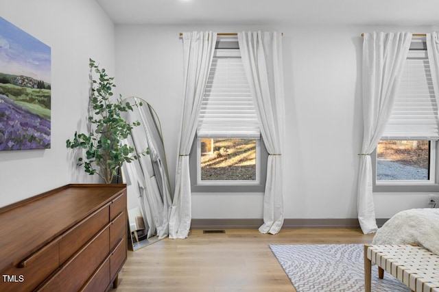 bedroom with light wood-type flooring