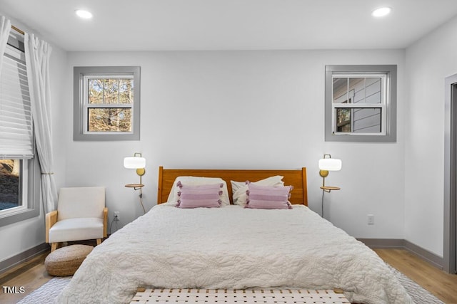 bedroom featuring hardwood / wood-style flooring