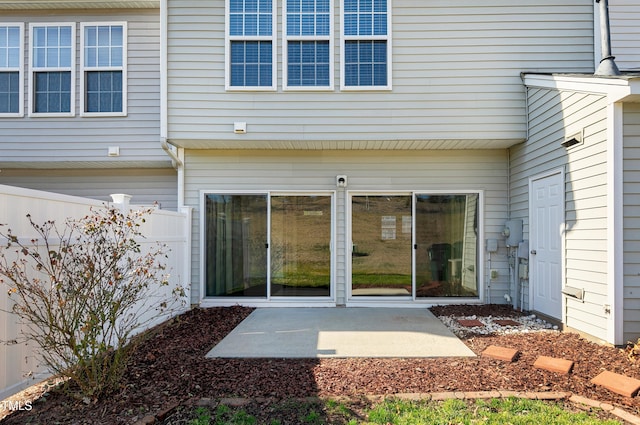 doorway to property with a patio