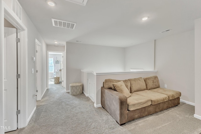 living room with light colored carpet