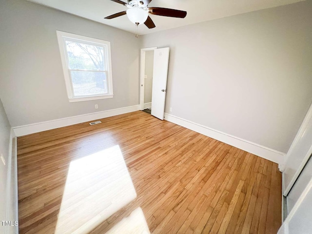 unfurnished bedroom with light wood-type flooring and ceiling fan