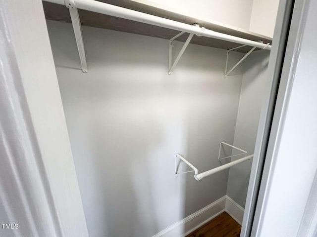 walk in closet featuring hardwood / wood-style floors