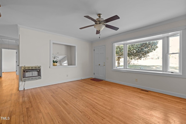 unfurnished living room with ceiling fan, light hardwood / wood-style flooring, ornamental molding, and heating unit