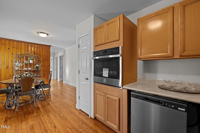 kitchen featuring stainless steel appliances and light wood-type flooring