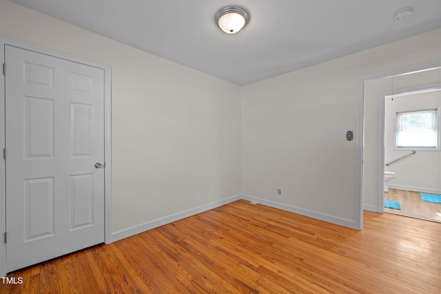 unfurnished room featuring light hardwood / wood-style flooring