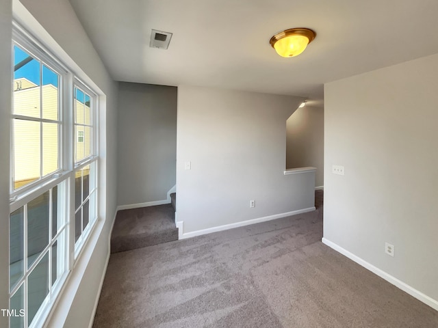 view of carpeted spare room