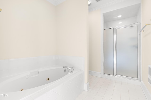 bathroom with a tub with jets, a stall shower, tile patterned flooring, and crown molding