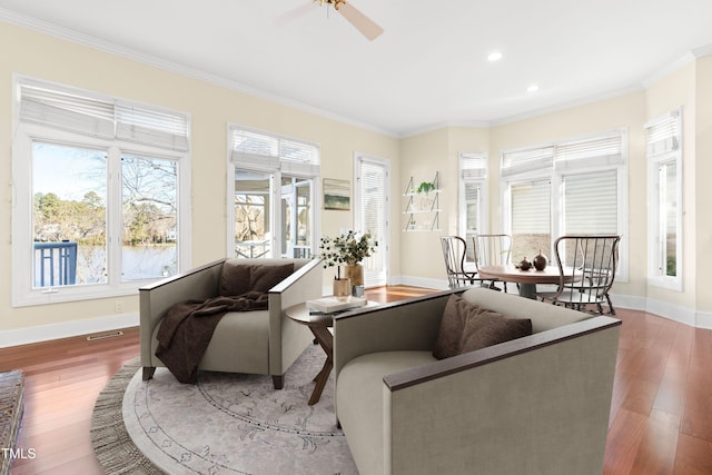 interior space with plenty of natural light, visible vents, and a ceiling fan