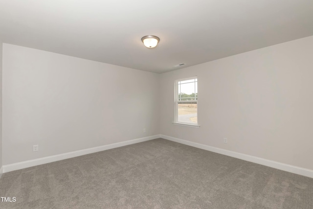 view of carpeted spare room