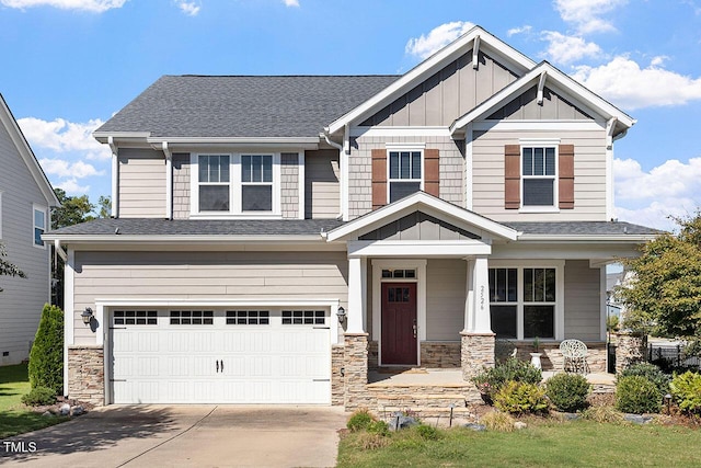 craftsman-style home featuring a porch and a garage