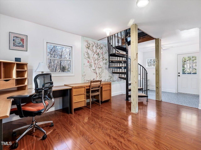 office with dark hardwood / wood-style flooring