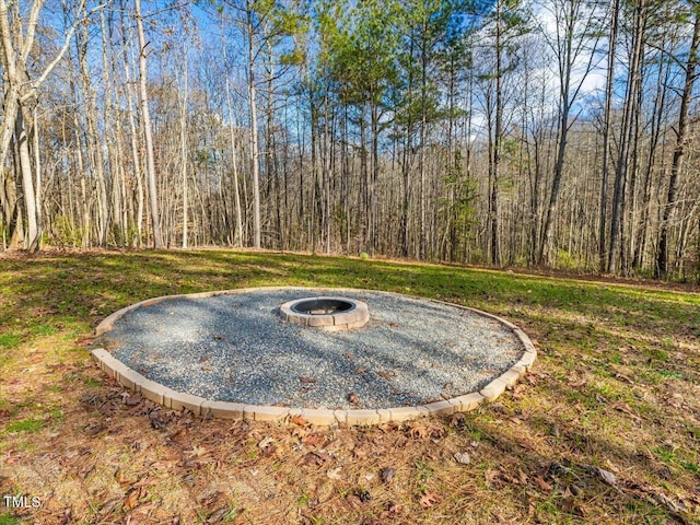 view of yard featuring a fire pit