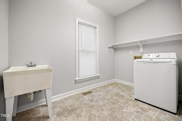 washroom featuring washer / dryer