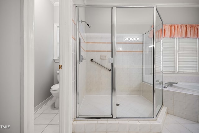 bathroom featuring tile patterned flooring, separate shower and tub, crown molding, and toilet