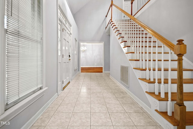 entryway featuring light tile patterned floors