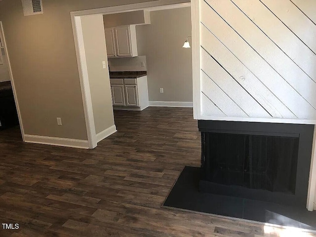 interior space with dark hardwood / wood-style flooring