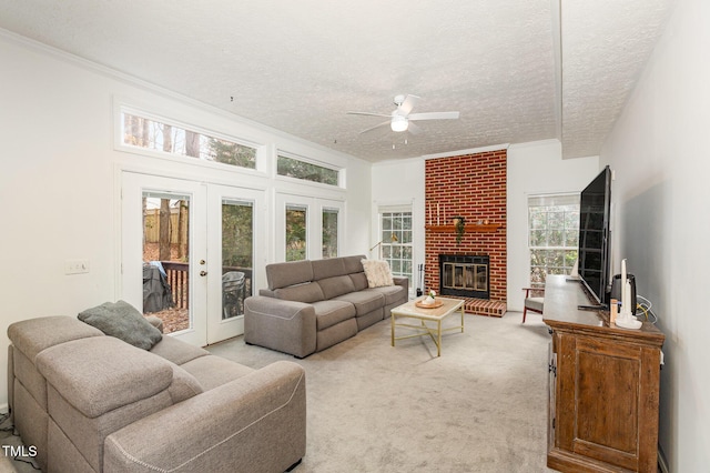 living room with light carpet, french doors, a textured ceiling, and ceiling fan