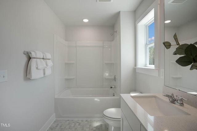 bathroom featuring baseboards, visible vents, vanity, and toilet