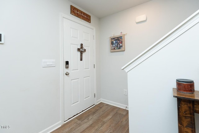 foyer entrance featuring hardwood / wood-style flooring