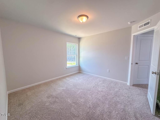 empty room with carpet floors