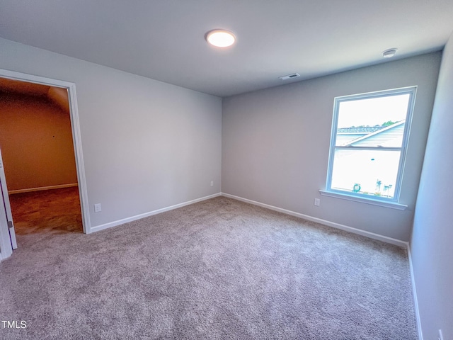 403 Duncan Creek Rd # 131, Lillington, NC 27546 - carpeted empty room with baseboards