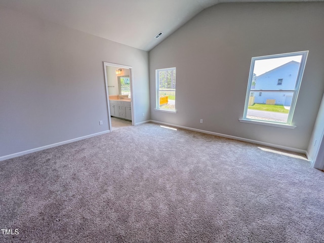 403 Duncan Creek Rd # 131, Lillington, NC 27546 - carpeted spare room with lofted ceiling and baseboards