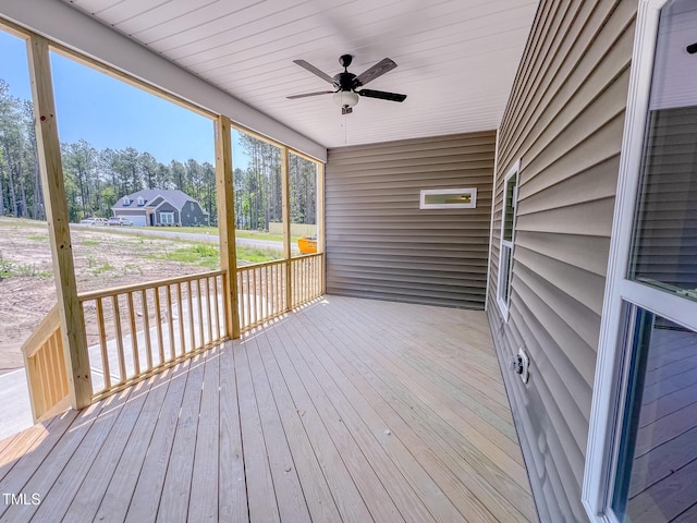 403 Duncan Creek Rd # 131, Lillington, NC 27546 - deck with a ceiling fan and view of wooded area