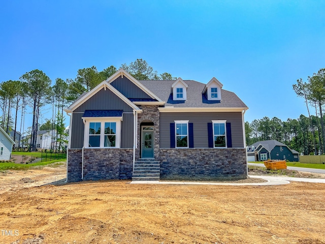 403 Duncan Creek Rd # 131, Lillington, NC 27546 - craftsman-style house featuring stone siding and board and batten siding