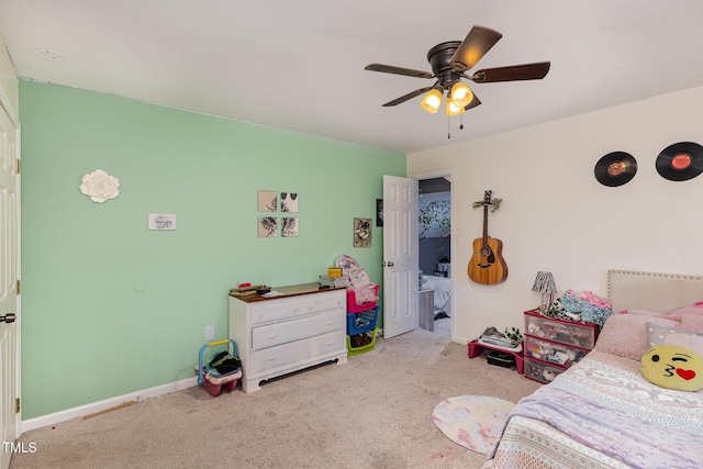 bedroom featuring ceiling fan and light colored carpet