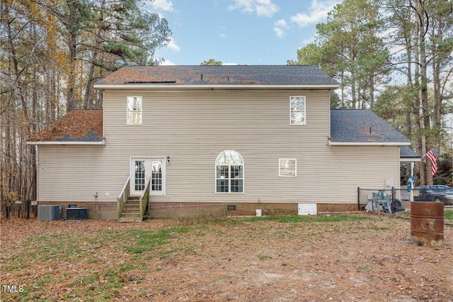 back of house with cooling unit